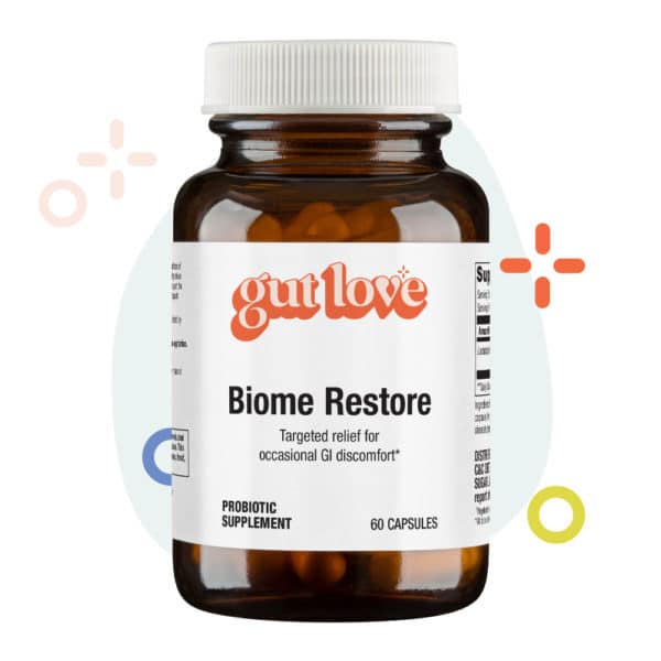 Biome Restore Probiotic Supplement opaque glass bottle with fun shapes and colors behind it
