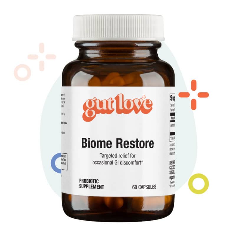 Biome Restore Probiotic Supplement opaque glass bottle with fun shapes and colors behind it
